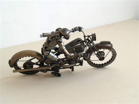 Delightful Metal Sculptures Made of Car and Motorcycle Parts