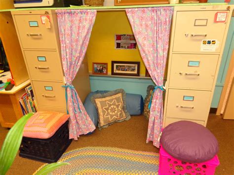 Use two filing cabinets to create a cute cozy corner or quiet area. The curtain rod and simple ...