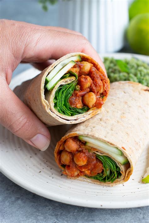 Vegan lavash wraps stuffed with a smoky chickpea, tomato, and onion ...