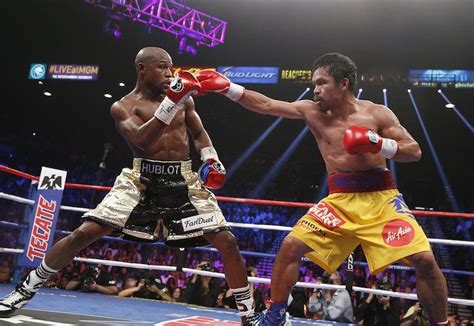 Floyd Mayweather and Manny Pacquiao Confirm Rematch - AmongMen