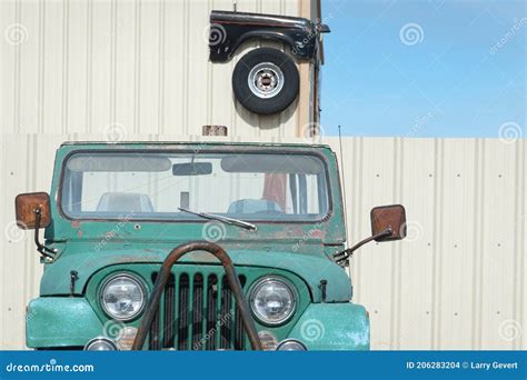 Old Jeep and Exterior Garage Wall Decor Stock Photo - Image of drive ...