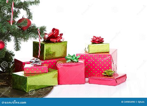 Christmas Presents Under a Christmas Tree Stock Photo - Image of decorative, birthday: 34985490