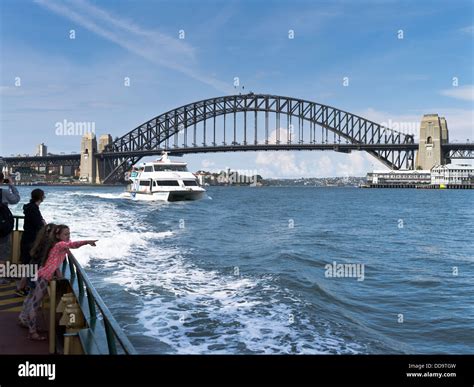 dh Sydney Harbour SYDNEY AUSTRALIA Children aboard ferry catamaran ferries bridge harbor people ...