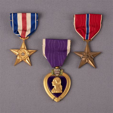 Silver Star, Bronze Star, and Purple Heart Medals awarded to Specialist Joe H. Brown ...