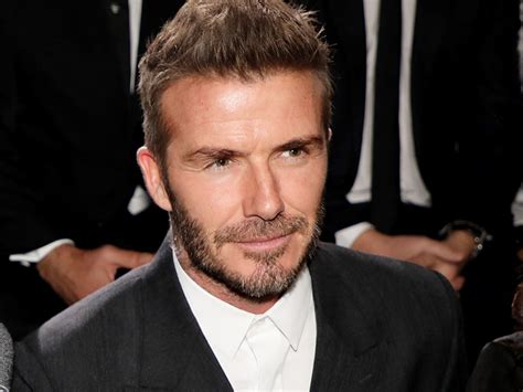 David Beckham fans 'in love' with new look as he sports green eyeshadow