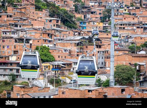 Metrocable or Cable car or gondola lift, H line, public transport, over Comuna 8, Medellín ...