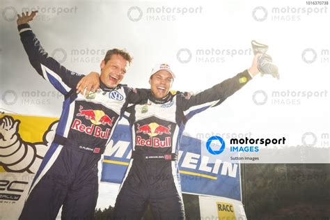 Rally winners Andreas Mikkelsen (NOR) / Ola Floene (NOR) Volkswagen Polo R WRC celebrate on the ...