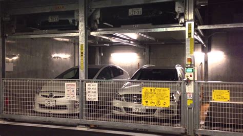 Japanese mechanical parking garage - YouTube