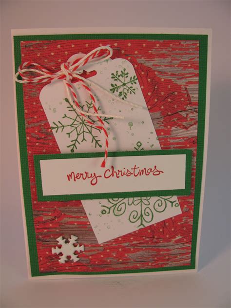 a handmade christmas card with snowflakes on it