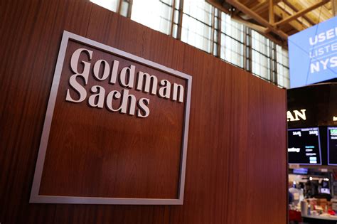 Goldman Sachs to slow hiring, cull bankers as profits slump