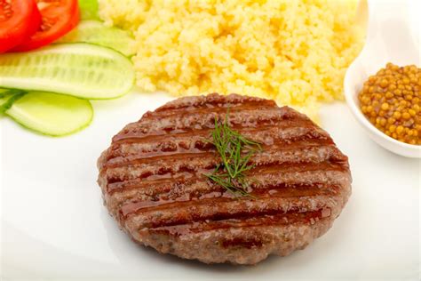 Beef cutlet on the plate 12843612 Stock Photo at Vecteezy