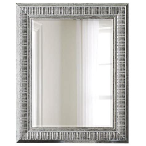 This 32 in. x 40 in. silver framed wall mirror compliments any home decor. The mirror create ...