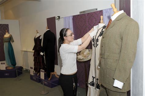 Look: Downton Abbey costumes worn by Dame Maggie Smith and cast go on display at Nuneaton Museum