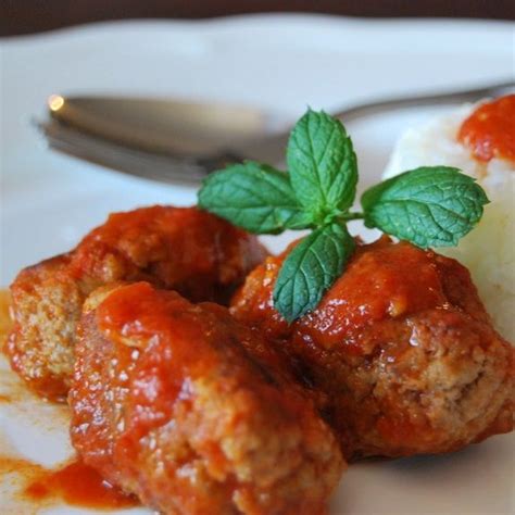 Pressure cooker kofte in cinnamon tomato sauce.Kofte are meatballs ...