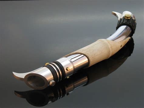 Elegance Redefined • This is Darth Bane’s curved hilt Lightsaber. This... | Darth bane ...