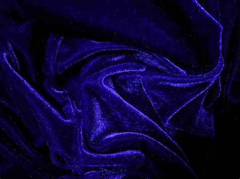 Blue velvet fabric texture used as background. Empty blue fabric background of soft and smooth ...