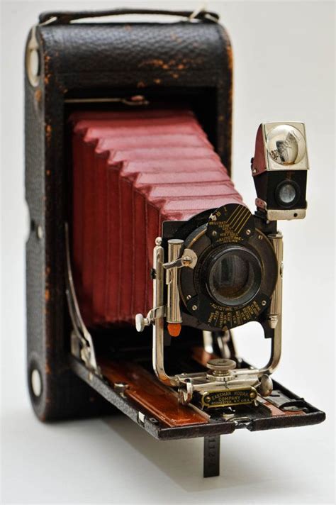 Antique Kodak camera. Early vintage Kodak 3-A folding camera model B-4, red bellows. Photography ...