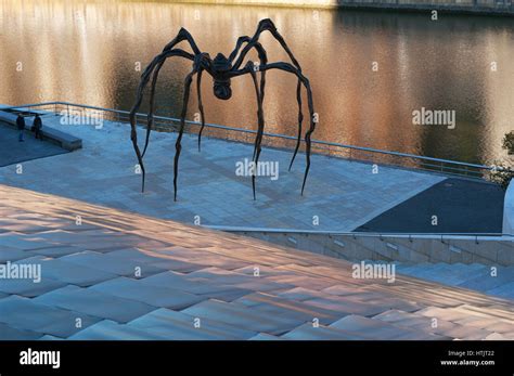 Maman, the giant spider sculpture by Louise Bourgeois at the exterior of the Guggenheim Museum ...