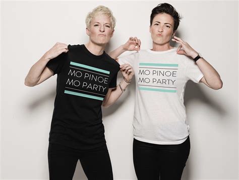 Twins Megan and Rachael Rapinoe, co-Founders of Rapinoe Brand apparel, showing off one of their ...