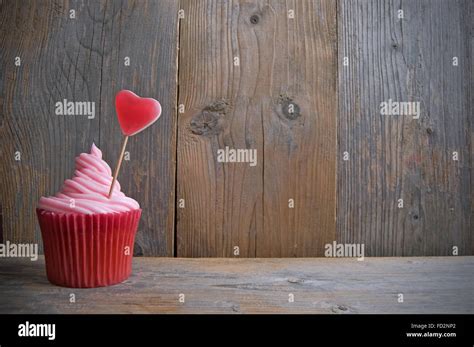 Cream cupcake with space for text Stock Photo - Alamy