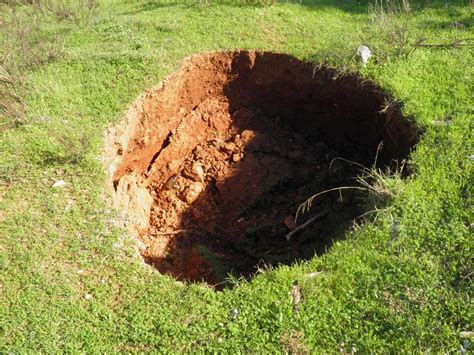 Signs Of A Sinkhole: What To Look For - Divinity Inspection Services