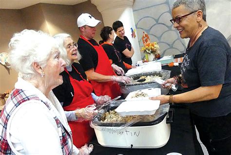 ‘An enormous amount of love’: Volunteers host Thanksgiving meals for more than 1,000 local ...