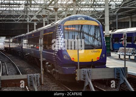 Class 170 turbostar train in Arriva Crosscountry trains livery at a railway station in England ...