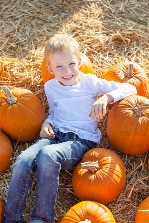 Kid at pumpkin patch stock photo. Image of fall, child - 61247628