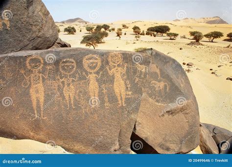 Ancient Rock Art in Sahara Depicting Four Figures Stock Photo - Image ...