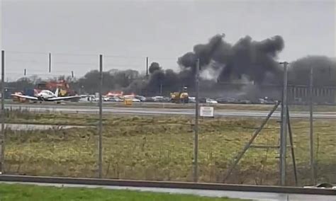 Moment fire rips through parked cars at Bristol airport with five 'completely destroyed' and ...