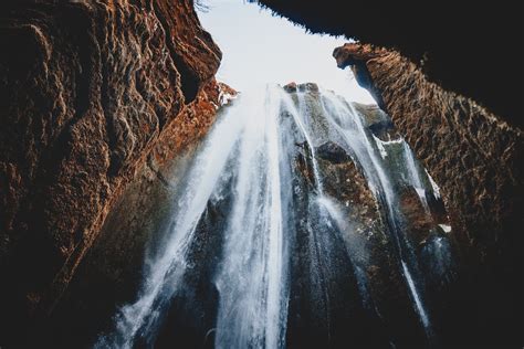 Gorgeous huge waterfall in ravine · Free Stock Photo