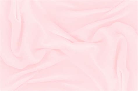 Soft pink fabric texture background. abstract cloth silk for wallpaper or backdrop | Premium Photo