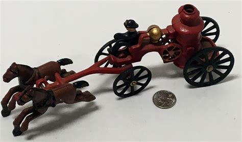 Sold Price: Vintage Cast Iron Double Horse-Drawn Fire Wagon w/ Driver ...