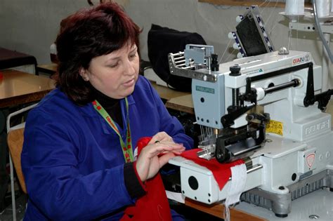 Free picture: female, worker, demonstrates, stitch, sewing machine
