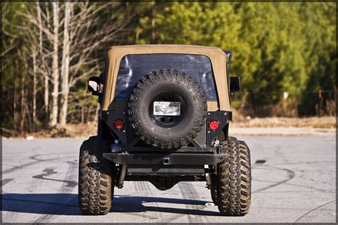 Blue TJ/LJ with Tan/Spice soft top - JeepForum.com