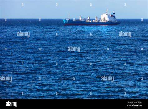 cargo ship in ocean Stock Photo - Alamy