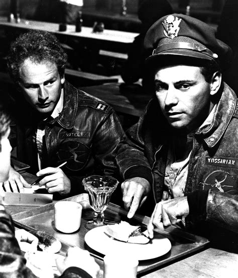 Art Garfunkel (as Capt. Nately) and Alan Arkin (as Capt. Yossarian ...