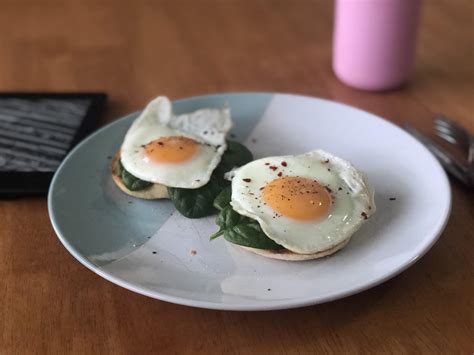 Fried eggs on a English muffins with a bed of home grown spinach : r/eggs