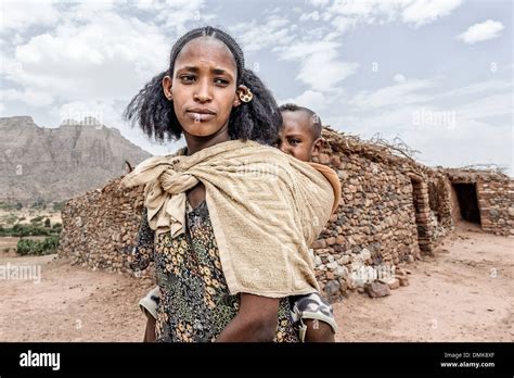 Tigray woman with child on her back, Tigray, Ethiopia, Africa Stock ...