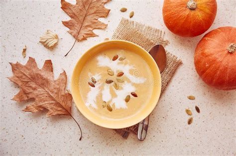 Vegetarian Seasonal Healthy Autumn Pumpkin Cream Soup with Seeds and ...