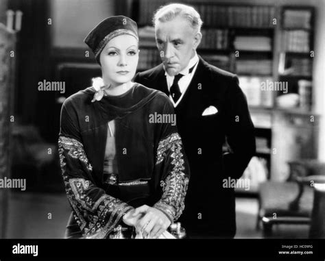 MATA HARI, from left, Greta Garbo, (in a costume by Adrian), Lewis Stone, 1931 Stock Photo - Alamy