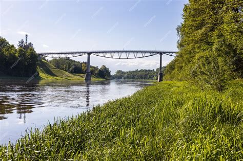 Premium Photo | White rose pedestrian bridge over the river of nemunas. alytus, lithuania