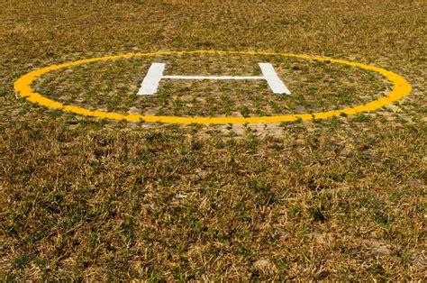 Helicopter landing pad on grass | Stock image | Colourbox