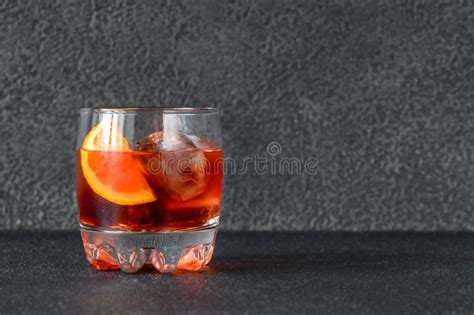 A Glass of Negroni Cocktail with Campari, Vermouth, Gin and Oranges. Stock Photo - Image of ...