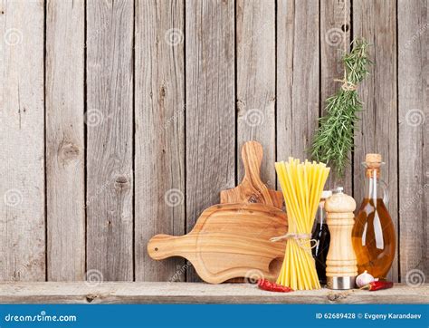 Kitchen Cooking Utensils and Spices on Shelf Stock Photo - Image of cooking, cook: 62689428