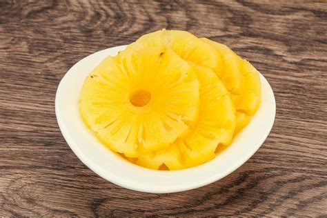 Marinated pineapple rings in the bowl 8510118 Stock Photo at Vecteezy