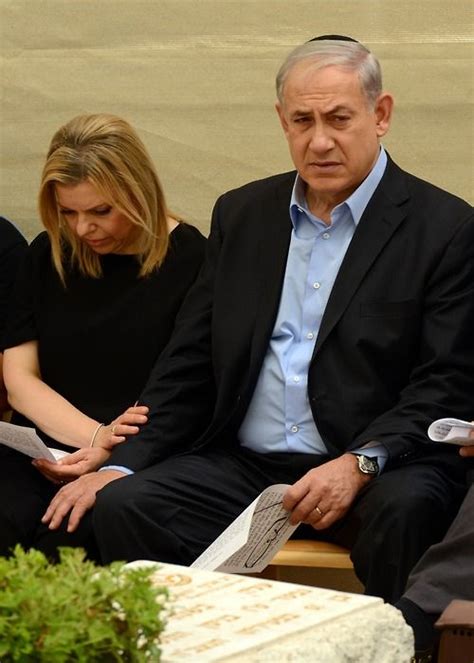 Israeli Prime Minister Benjamin Netanyahu and his wife Sara seen next to the grave of PM ...