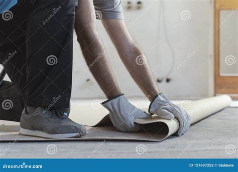 Contractor Removing an Old Linoleum Flooring Stock Photo - Image of ...