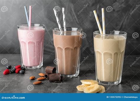 Glasses with Different Protein Shakes and Ingredients on Table Stock ...