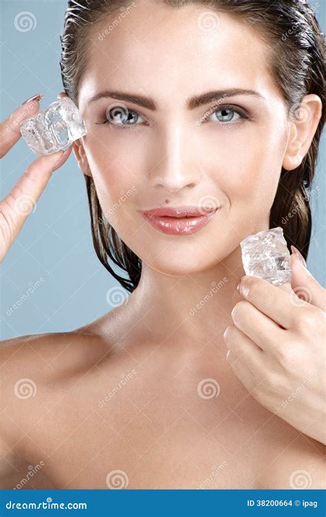 Beautiful Woman Applying Ice Cube Treatment on Face Stock Photo - Image ...